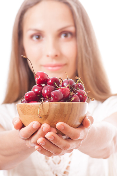 bowl of cherries in womens hands - Φωτογραφία, εικόνα