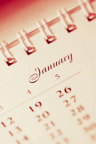 close up of a calendar with a pencil - Фото, изображение