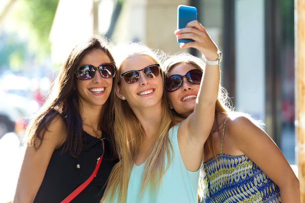 Group of friends taking selfie in the street.  - Fotó, kép