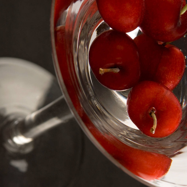 red wine in a glass jar on a black background - Photo, image