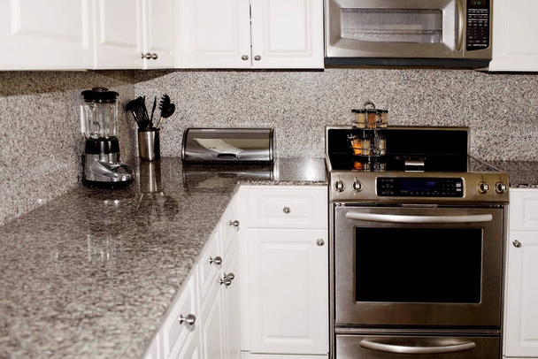 modern kitchen interior with appliances and a large window - Фото, зображення