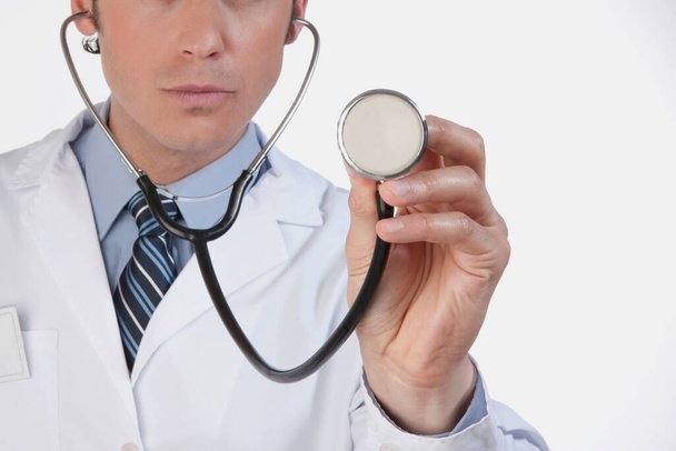 doctor with stethoscope and white background - Foto, immagini