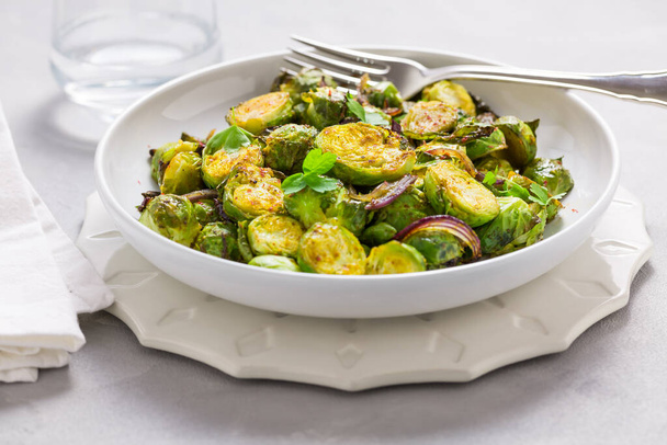 Baked Green Brussels Sprouts with honey and Parmesan cheese. - Fotoğraf, Görsel