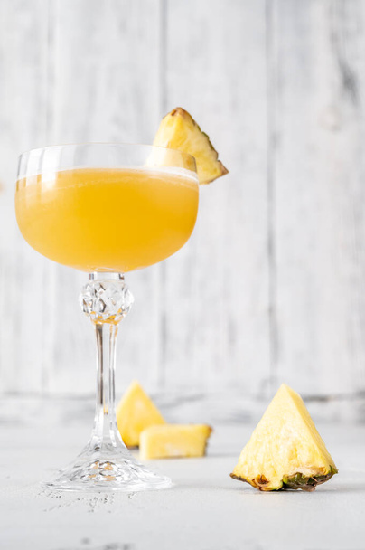 glass of tasty pineapple juice on wooden table - Zdjęcie, obraz