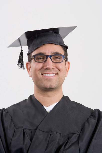 young man with graduation cap and diploma - 写真・画像