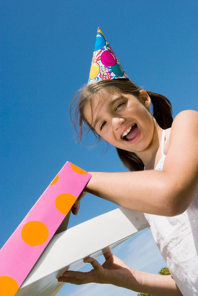 portrait of a happy girl with a kite - Fotó, kép