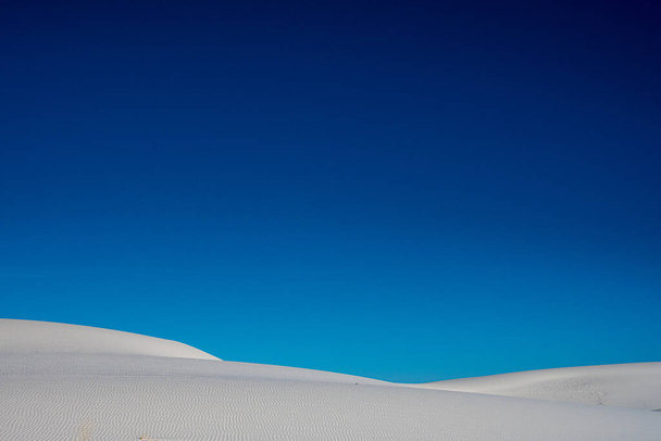 Deep Blue Sky Fills The Frame With White Sands Below in New Mexico park - Фото, зображення