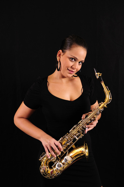 Молода жінка з саксофоном
 - Фото, зображення