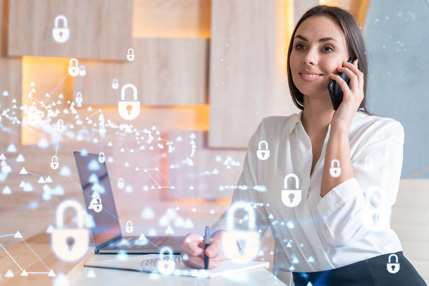 Attractive businesswoman in white shirt has conference call of cyber security in compliance division to protect clients confidential information. IT hologram lock icons over office background - Foto, afbeelding