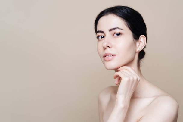 Beauty portrait of woman face with natural skin - Fotó, kép