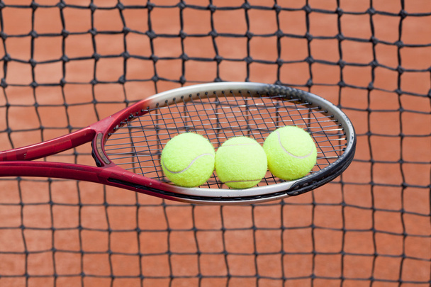 Tennis racket and tennis ball, sports equipment - Fotografie, Obrázek