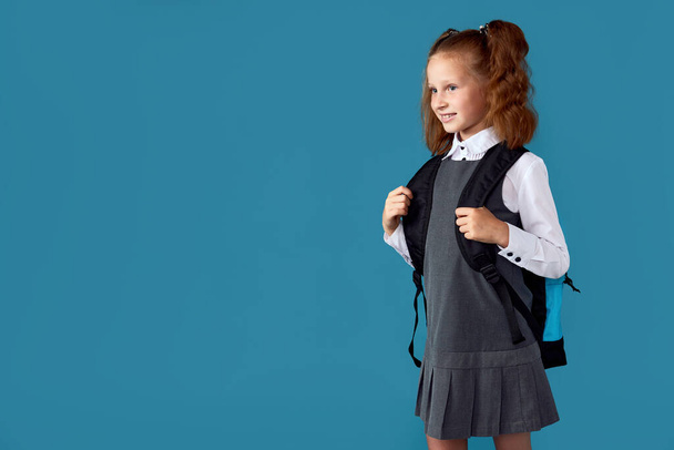 adorable schoolgirl with backpack. Back to school - 写真・画像