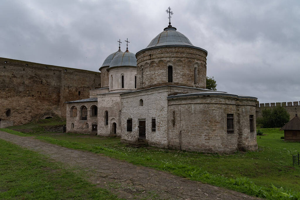 Ancient Church of Saint Nicholas and Church of Dormition of the Mother of God on territory of Ivangorod Fortress that was built in 1492. Ivangorod, Russia - Fotoğraf, Görsel