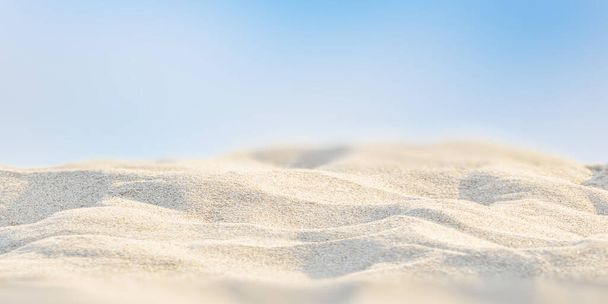 Blurred beach sand for background, sandy beach with blur sea on background. - Foto, Imagem