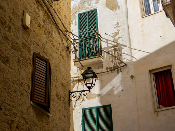 Picturesque houses in the old town in Polignano a Mare, Apulia, Italy - 写真・画像