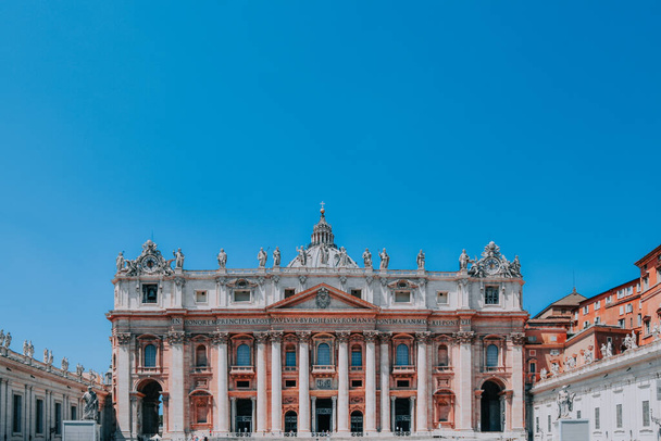 A vertical view of St. Peter's Basilica church under blue clear sky in Vatican City, Italy - Valokuva, kuva