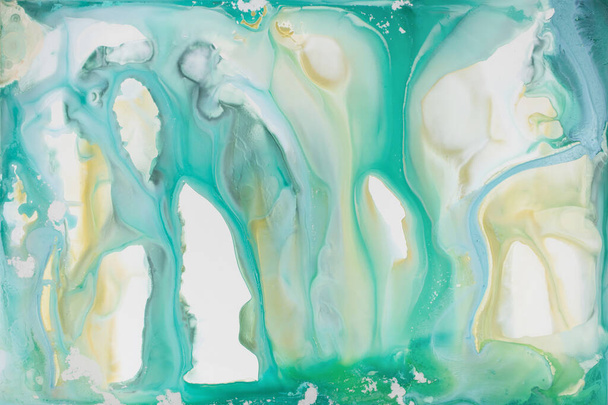 Abstract fluid acrylic painting. Marbled blue abstract background. Liquid marble pattern. Hand painted background with mixed liquid blue and green paints. Modern art. - Photo, Image