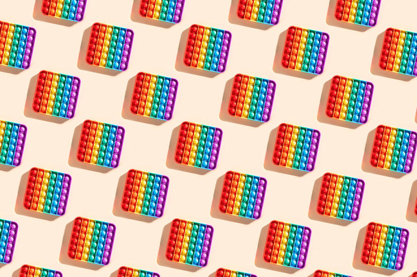 Padrão arco-íris pop-lo bolha brinquedos Fidget sensoriais - Foto, Imagem