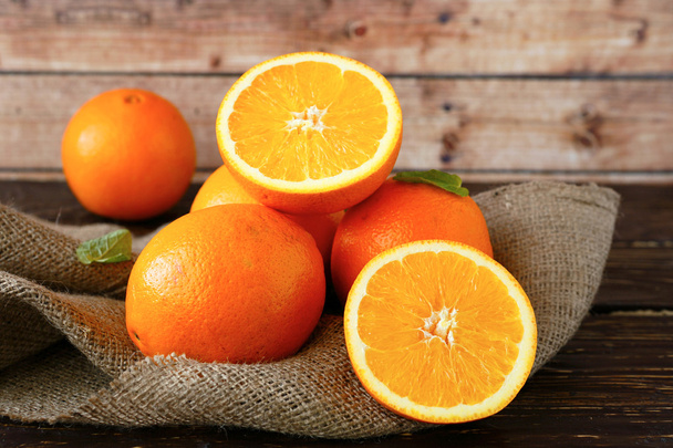 ripe orange cut in half - Foto, Imagem