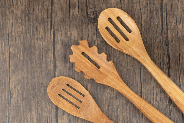 Close up photo of wooden spoon set. High quality photo - Photo, Image