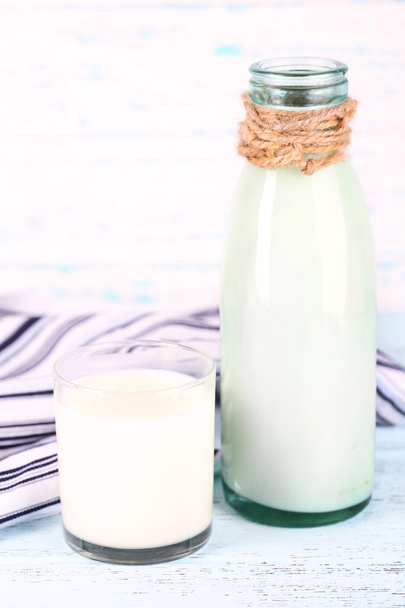 Glass bottle of milk - 写真・画像