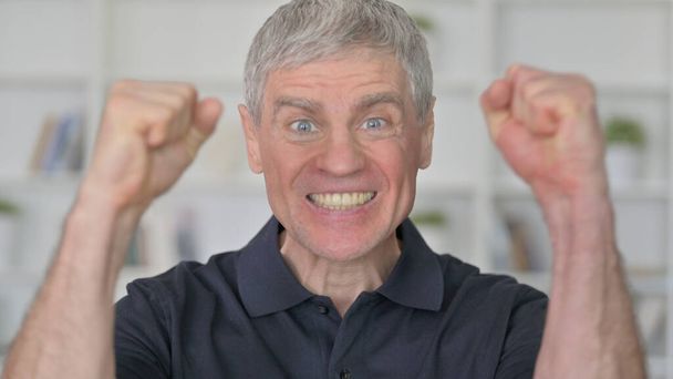 Excited Middle Aged Man Celebrating Success - Foto, Imagen