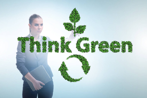 Think green ecological concept with businesswoman - Photo, Image