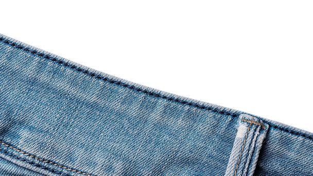 Old Blue jeans fabric denim texture isolated on white background for design. Canvas denim. Close up view. fabric frame with copy space, text place. Fashion clothes conceptual frame - Photo, image
