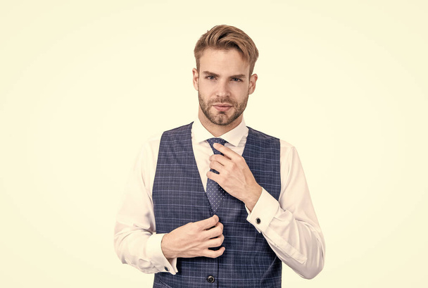 The tie gets tough again. Boss wear vest with necktie. Fashion accessory. Stylish menswear and accessory - Fotó, kép