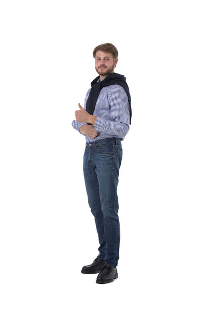 Full length portrait of young man showing thumb up isolated on white background - Fotografie, Obrázek