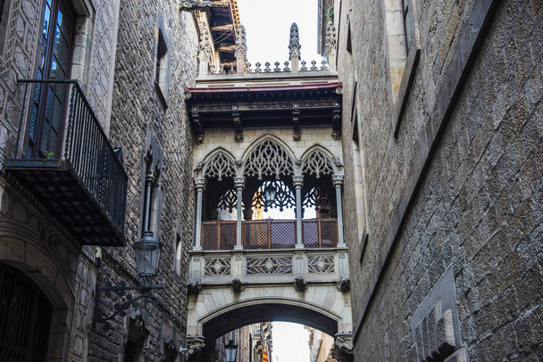 Bishops Bridge or Pont del Bisbe is a famous architectonic feature connecting buildings Casa dels Canonges (Canons House) and the Palau de la Generalitat in Gothic Quarter of Barcelona, Spain. It was built in 1928 by Joan Rubi. - Photo, image