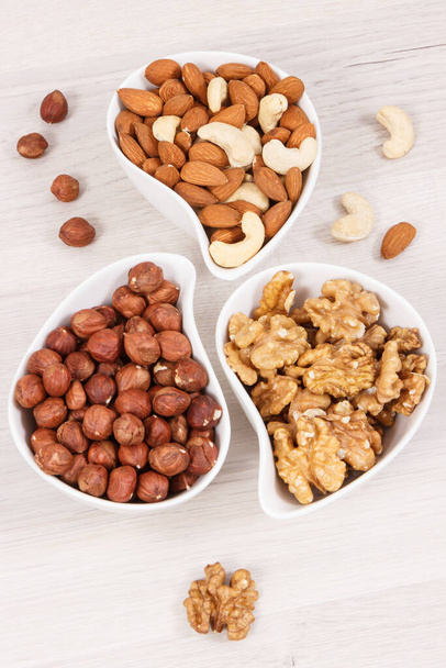 Various nuts and almonds, concept of healthy nutrition and lifestyle - Foto, Imagem