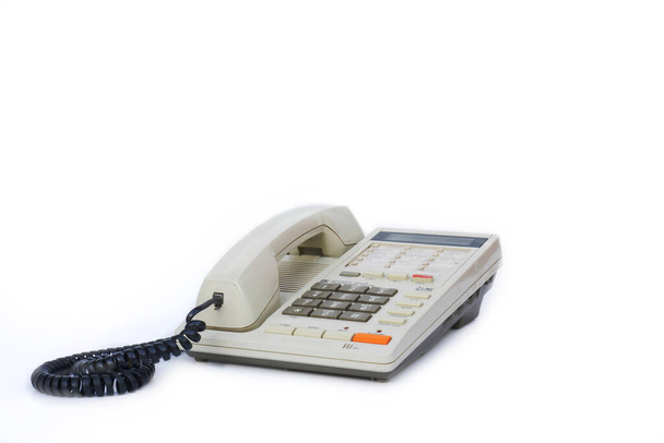 vintage dial-up digitální telefon na stole. Selektivní soustředění. izolované bílé pozadí. - Fotografie, Obrázek