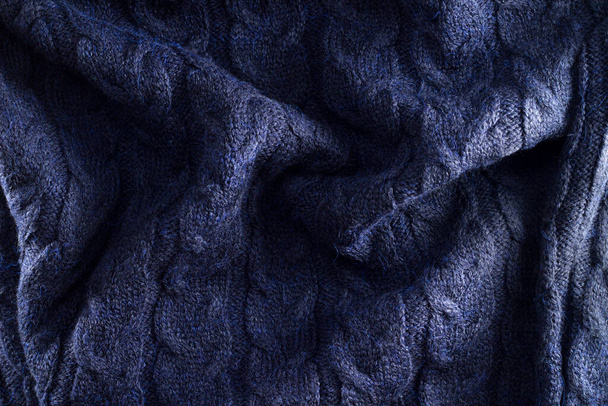 Επίπεδη διάταξη από αφηρημένο φόντο μπλε υφή πλεκτού υφάσματος με όμορφο φως - Φωτογραφία, εικόνα