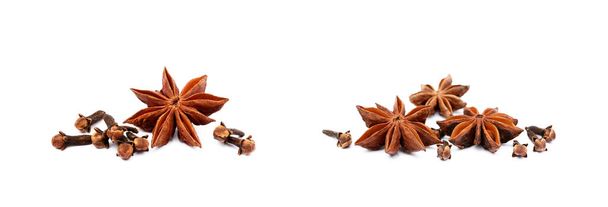 Anice stellato aromatico e chiodi di garofano isolati su fondo bianco - Foto, immagini