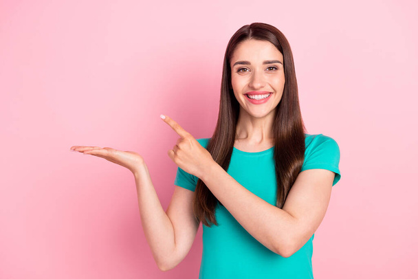 Photo of young woman happy positive point finger promo advert decision isolated over pink color background - Фото, изображение
