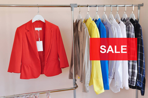 Clearance Sale business clothes rack with a selection of fashion for woman - Foto, imagen