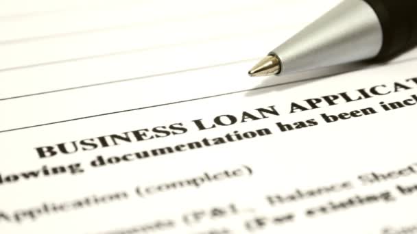Close up of business loan application dolly shot - Záběry, video