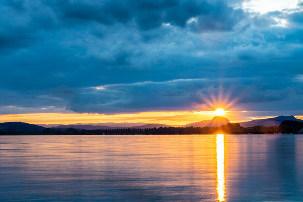 Éclatement de nuages sur le lac de Constance - Photo, image