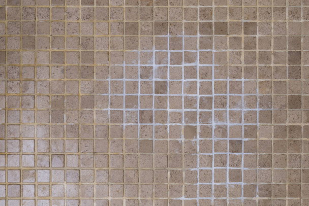 mosaic tile on shower wall or floor, DIY repairing bathroom tile grout, restroom cleaning - Фото, изображение