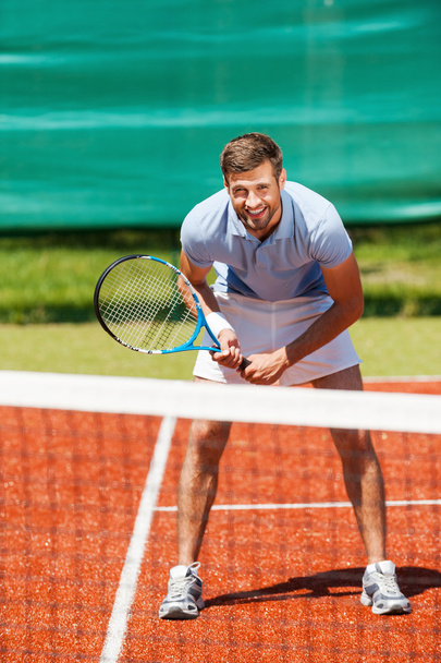 Young man holding tennis racket - Photo, Image