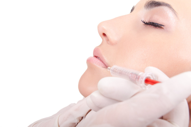 Injection into female lips - Foto, imagen