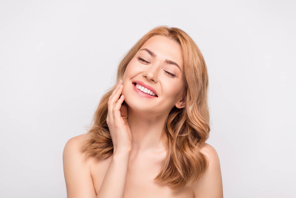 Photo portrait woman touching cheeks smooth skin smiling overjoyed isolated white color background - Foto, Imagem