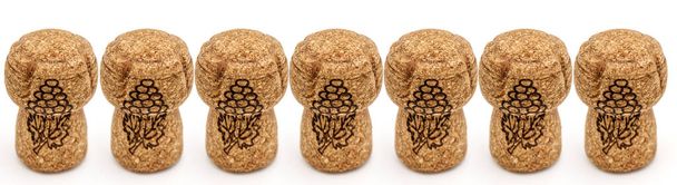 cork plugs from champagne bottles on white background - Photo, Image