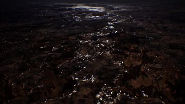 Natural Glossy Mud Puddle Ground Closeup. - Footage, Video