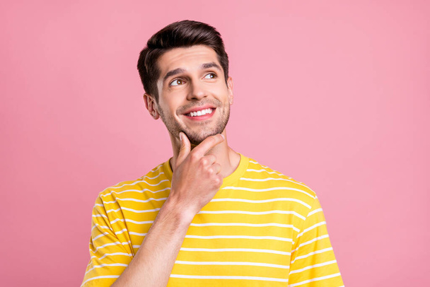 Portrait of attractive dreamy cheerful minded guy touching chin deciding isolated over pink pastel color background - Foto, immagini