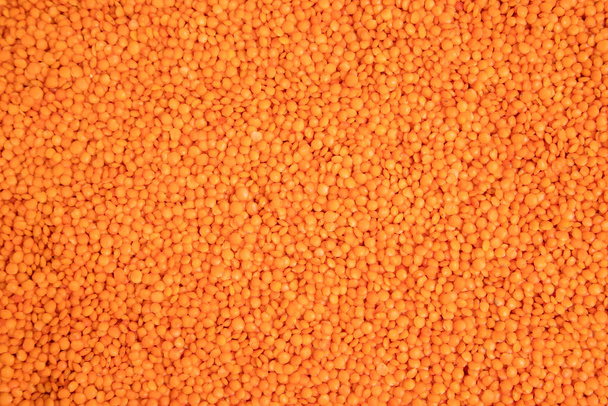 Montón de frijoles de lentejas rojas sin cocer como fondo. Foto de alta calidad - Foto, Imagen