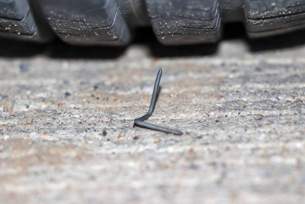 Nail trap and sharp on the road - Photo, Image