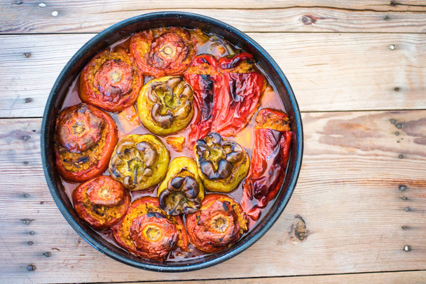 Gemista or Yemista , a traditional Greek food. Vegetables (tomatoes, ball peppers) filled with rice (sometimes also ground meat). - Fotografie, Obrázek