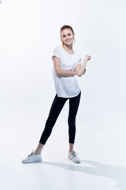 woman in sports uniform  after workout posing  - Foto, Bild